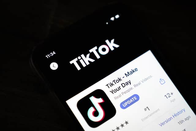 WASHINGTON, DC - AUGUST 07: In this photo illustration, the download page for the Tik Tok app is displayed on an Apple iPhone (Photo Illustration by Drew Angerer/Getty Images)