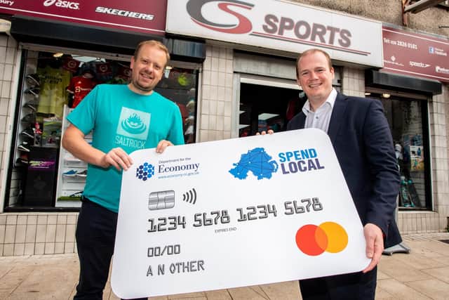 Economy Minister Gordon Lyons at CS Sports, Larne, during a recent visit to meet with business owners to promote the Spend Local card initiative.