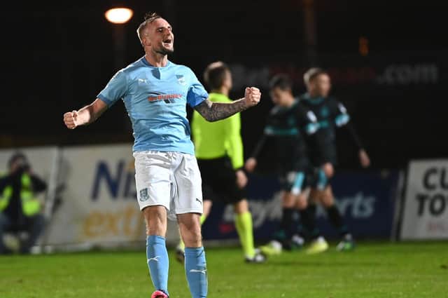 Jude Winchester celebrates after firing Ballymena United in front
