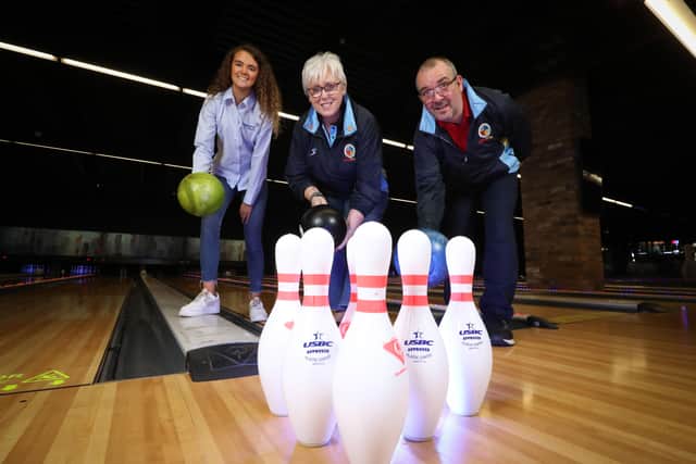 (L-R) Power NI’s Aoife Magennis alongside Chair of Lisburn2gether Special Olympics Club Lorraine Foster and Bowling Head Coach David Hilland at Lisburn Bowl who are celebrating receiving a £1000 Brighter Communities grant.
