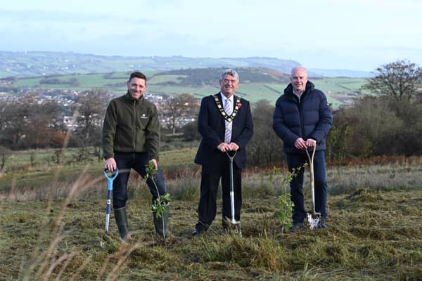 Ian McCurley (Director for Woodland Trust Northern Ireland) with Jim McCooe (Lloyds Banking Group Ambassador for Northern Ireland) and Mayor of Antrim and Newtownabbey, Cllr Billy Webb MBE JP. Picture by Michael Cooper.