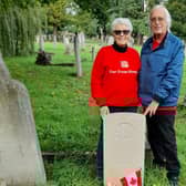 Diana Beaupré and Adrian Watkinson at the grave of Henry Thomas Hobbs which they located in Surrey