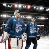 Belfast Giants’ Tyler Beskorowany with team-mate Sam Ruopp.