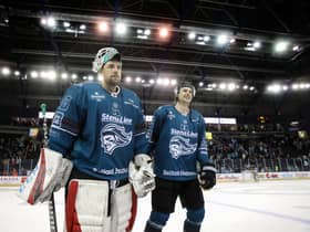 Belfast Giants’ Tyler Beskorowany with team-mate Sam Ruopp.