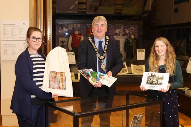 The Mayor of Causeway Coast and Glens Borough Council Councillor Richard Holmes pictured with Museum Services Officers Sarah Carson and Jamie Austin as they launch the new History at Home initiative