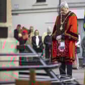 A moment of reflection for the Mayor of Causeway Coast and Glens Borough Council Councillor Richard Holmes at the War Memorial in Coleraine during an Armistice Day service held on Thursday 11th November.