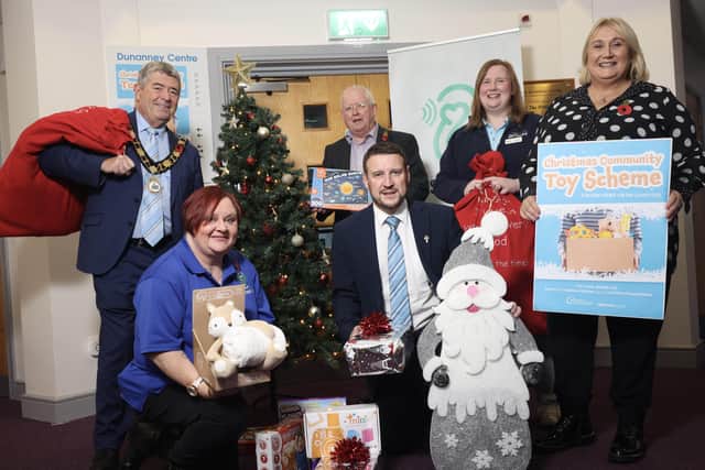 The Mayor of Antrim and Newtownabbey Cllr Billy Webb, Alderman John Smyth,  Alderman Julian McGrath , Isobel from Habitat for Humanity and Karen from Listening Ear, at the launch of the community toy scheme.