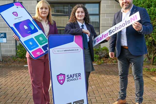 Education Minister Michelle McIlveen, school pupil and Secondary Students’ Union NI member, Clara McDevitt and Colin Stitt, head of Safer Schools App (iNEQE)