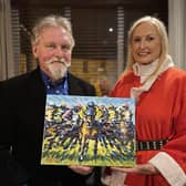 One of Ireland's leading equestrian artists Leo Casement presented Joan Cunningham organiser of the Saintfield Christmas Charity Ride with one of his fabulous paintings StarBurst to be auctioned to raise funds for the Saintfield Christmas Charity Ride which takes place on Saturday 4th December