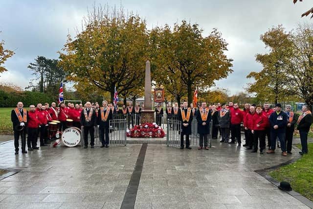 Members from the Loyal Orders and Sons of Kai Flute Band pictured at Glengormley War Memorial.
