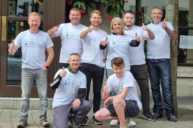 Philip Strain’s co-workers from Craigavon company Envision Intelligent Solutions supported him in his fundraising efforts. Philip was the company’s charity co-ordinator and he’s pictured here (front left) with his colleague at an abseil at the Europa Hotel in Belfast.