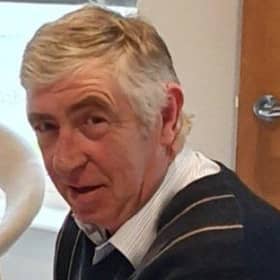 Jim Elliott says the persistent failure of Garda to question a man jailed for boobtrapping his father’s body for murder amounts to collusion with the IRA.