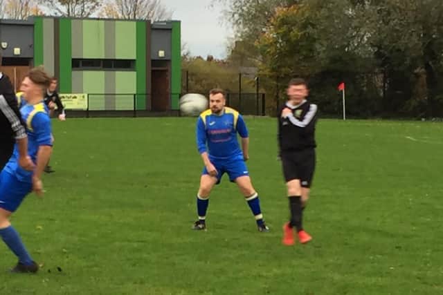 Midfielder Michael Deeny keep a watchful eye for the Carryduff Colts in Saturday’s cup game