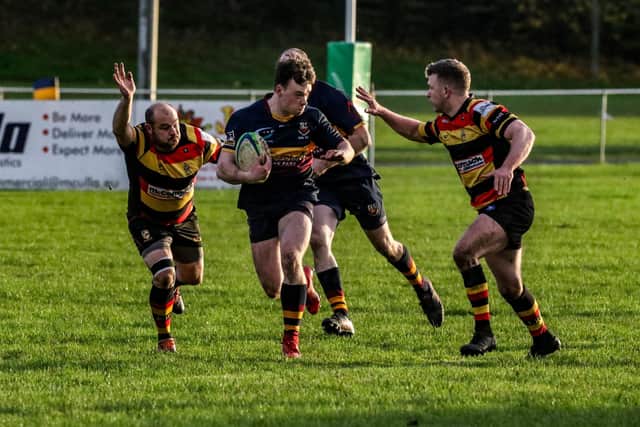 Josh Graham in determined mood in Bann Fifths' game against Lurgan Seconds