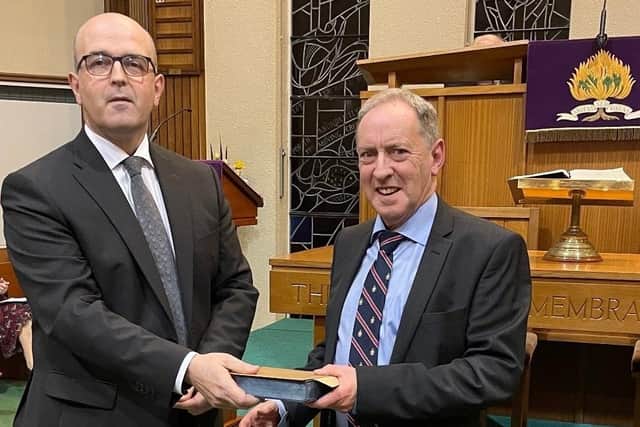 Maurice Christie (Cleark of Session) makes a prsentation to Rev McClean