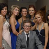 David Crothers pictured with, from left, Emma Reilly, Jordan Hughes, Catherine O'Neill, Becky Doherty, Rachel McEllhatton and Rebecca O'Reilly at the Foyle and Londonderry College formal in the City Hotel on Friday night. INLS4810-134KM
