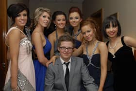 David Crothers pictured with, from left, Emma Reilly, Jordan Hughes, Catherine O'Neill, Becky Doherty, Rachel McEllhatton and Rebecca O'Reilly at the Foyle and Londonderry College formal in the City Hotel on Friday night. INLS4810-134KM