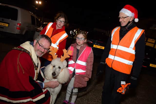 The Eco Rangers helped the Mayor, Cllr William McCaughey, switch on the lights.
