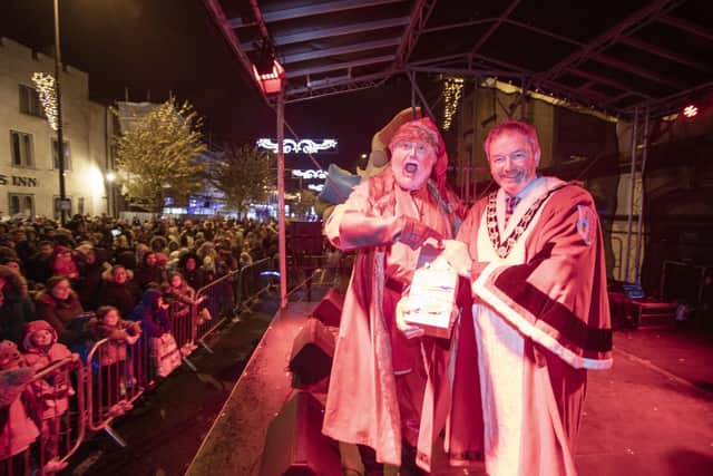 The Mayor, Cllr William McCaughey and Santa preparing to switch on the lights in Carrick at the weekend.