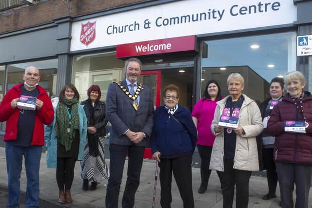 Volunteers from Salvation Army alongside Mayor, Cllr William McCaughey, Yvonne Carson NHSCT and Deborah Neill, MEA Loneliness Network member.