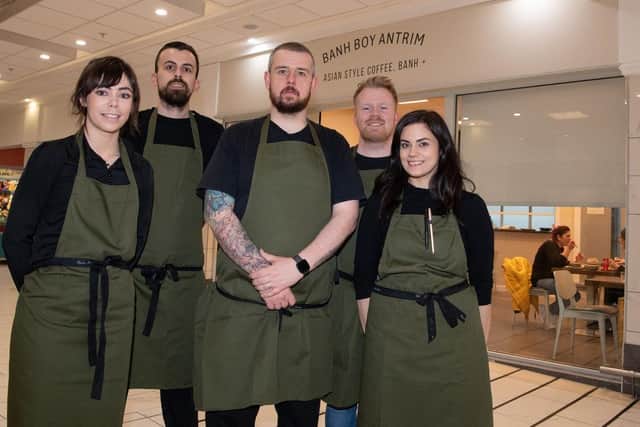 Pictured (L-R) outside Banh Boy Antrim, a new Vietnamese style eatery which opened in Castle Mall on Friday is Leah Watsonn, John Smyth, owner Gerard McQuillan, Gus Henry and India McQuillan.