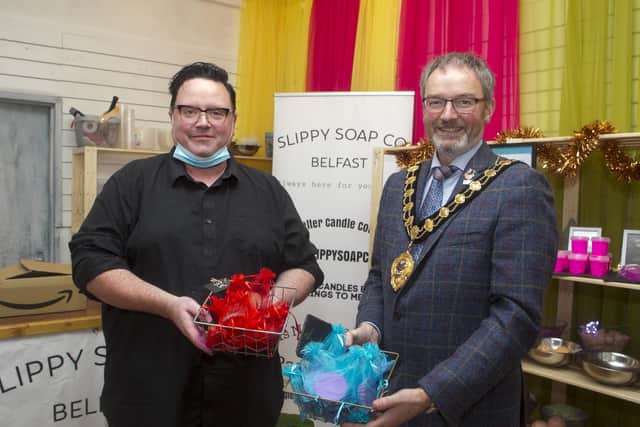 The Mayor, Cllr William McCaughey, with the owner of Slippy Soap Company, who recently opened his new business in North Street, Carrickfergus.