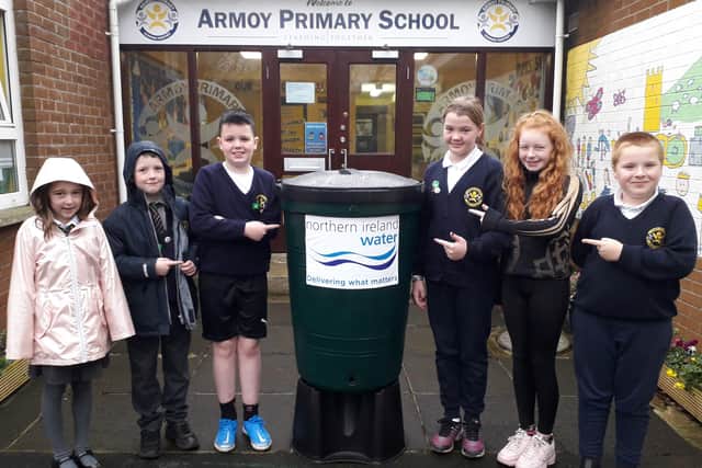 Pupils from Armoy Primary School pictured with their new waterbutt