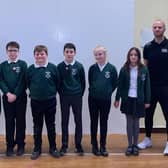 Pictured are P7 representatives of the School Council who will share their understanding of handball throughout the school. Also featured are teacher Mr Ruaidhri Quinn (left) and Darragh  Daly (right)