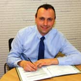 Keith Buchanan DUP candidate for Torrent signing his nomination papers ahead of the forthcoming elections