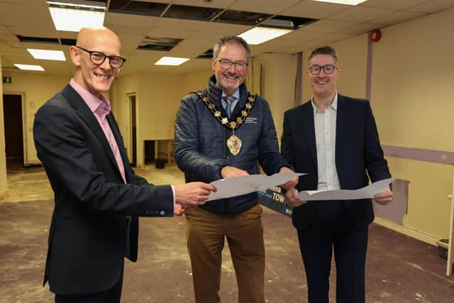 Charles Lynn (L) and Stuart Brewster (R) from Lynn and Brewster Ltd who have secured support through the first phase of the Town Centre Property Repurposing Scheme. Pictured with the Mayor of Mid and East Antrim, Cllr William McCaughey, in their subject property on Church Street, Ballymena.
License: Media Use