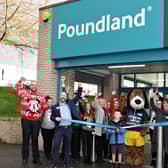 Caden Moore of Make a Wish cutting the ribbon to officially open the Ballymoney Poundland