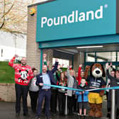 Caden Moore of Make a Wish cutting the ribbon to officially open the Ballymoney Poundland