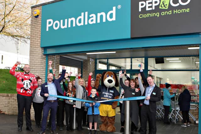 Caden Moore of Make a Wish cutting the ribbon to officially open the Ballymoney Poundland