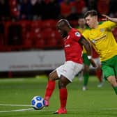 Fuad Sule and Paul O'Neill battle for the ball