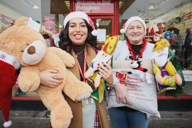 Ellie Loughran and Violeta Dunduliene at the Portadown British Heart Foundation shop .