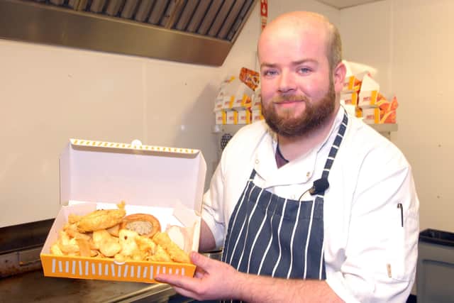 Gareth Johnston with the new battered Christmas dinner on offer at Park Avenue Takeaway in Lurgan