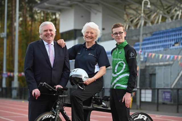 Oliver Gunning with Lady Mary Peters and Mark Burns, Bluewater Financial Planning, which has provided £2,000 towards the athlete's aim of competing at the Commonwealth Games in Birmingham 2022. 
Picture by Stephen Hamilton