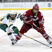 Vermont Catamounts' Rob Darrar with UMass Minutemen's Dominic Trento during Friendship Four game at the SSE Arena, Belfast in 2016