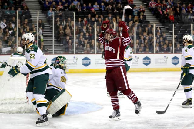 UMass Minutemen's Griff Jeszka celebrates scoring against Vermont Catamounts during a Friendship Four game at the SSE Arena, Belfast in 2016