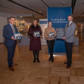 Pictured is Mayor of Mid and East Antrim, Cllr William McCaughey with Philip Thompson, Acting Chief Executive; Angeline King, who created the poem ‘Home’ as part of the project’s creative initiative and inscribed on the stone tablet featured; Councillor Cheryl Brownlee, Chair of Council’s NI Centenary Working Group; Mukesh Sharma, Chair, National Lottery Heritage Fund Northern Ireland Committee and Jayne Clarke, Museum and Heritage Manager.