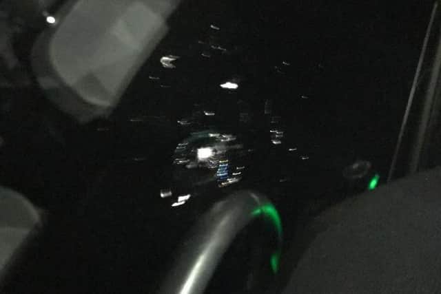 A car belonging to PSNI officers was attacked as they responded to a call in Lurgan's Kilwilkie area.
