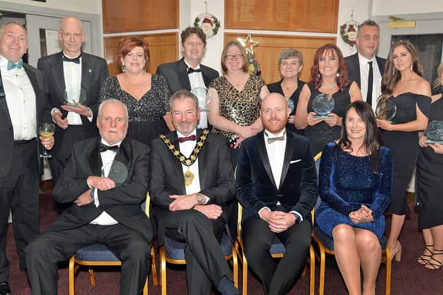 The main prizewinners and sponsors at the Carrick Business Excellence awards including front row from left, Bob Harper, Lifetime Achievement Award winner, Mayor, Councillor William McCaughey from principal sponsor Mid & East Antrim Borough Council, compere, Barra Best and Jenny Small, VP of Performance and Development Northern Regional College. Also included third, back row, is Kelli McRoberts, manager with category sponsors Carrickfergus Enterprise. INCT49-209.