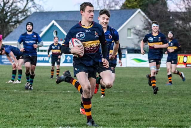John Porter on his way to the try line in Bann Thirds' game against Queen's Seconds. Picture: John Mullan