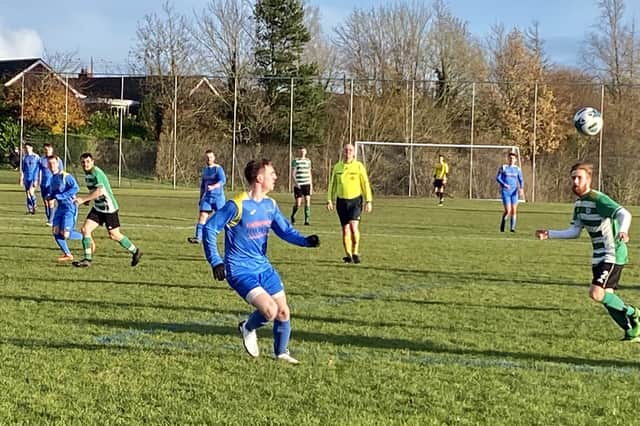 Carryduff Colts goal scorer Ciaran Sherry on the move for the Colts against Belfast Celtic YM