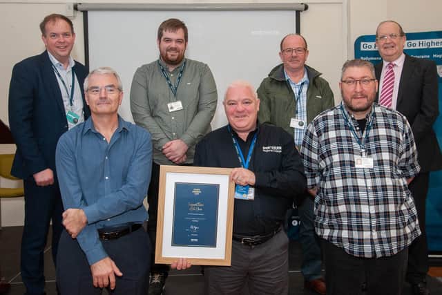 Support Team of the Year  Joint Winners - Coleraine Estates Decant Team (Gregory Mulholland, John Walker, Darryl McCorriston, Ken Fillis, Chris Mawhinney, Jim Hogg, Craig Ferguson, Theo Dunlop, Darryl Tindle and Gary Ramsey) with Sean Laverty, Chief Operating Officer (back left)