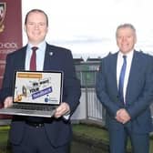 Pictured left to right are Zara Thorpe, Head Girl at Dalriada School, Economy Minister Gordon Lyons, and Tom Skelton, Principal Dalriada School