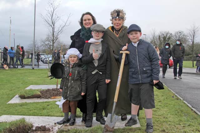 The Time Capsule was planted by Nora Stuchfield (P1), Zac Minford (P7) and Ethan Russell (P6). Included are Loanends Primary School Principal Mrs Linda Armour; and special guest Baroness Hoey of Lylehill and Rathlin.