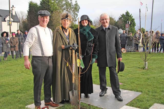 Planting the commemorative tree at Loanends Primary School to mark the NI Centenary are, from left: Mel Lucas, Baroness Catharine Hoey; Principal Mrs Linda Armour; and Richard McCourt, chairman, Board of Governors.