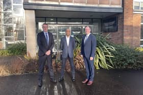 Wrightbus MD, Neil Collins, Wrightbus CEO, Buta Atwal, and First
Minister Paul Givan outside the Wrightbus factory in Ballymena.