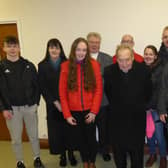 James, centre front, with his daughter Judith, grandchildren Jamie and Ryan, Rev Barry and some band members.